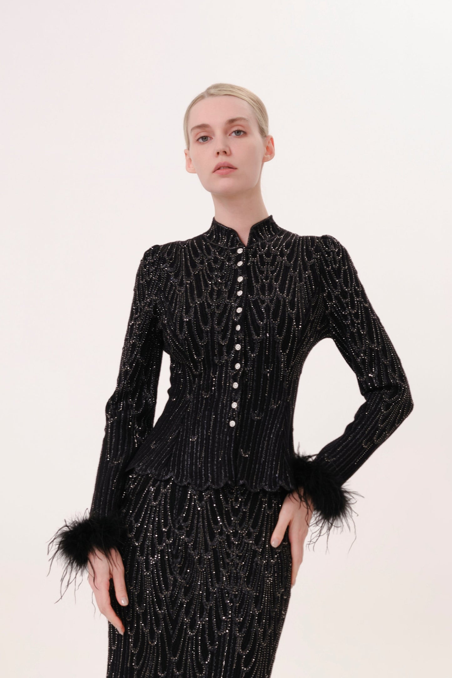 Black Mock Neck Feather Trim Rhinestone Knit Top