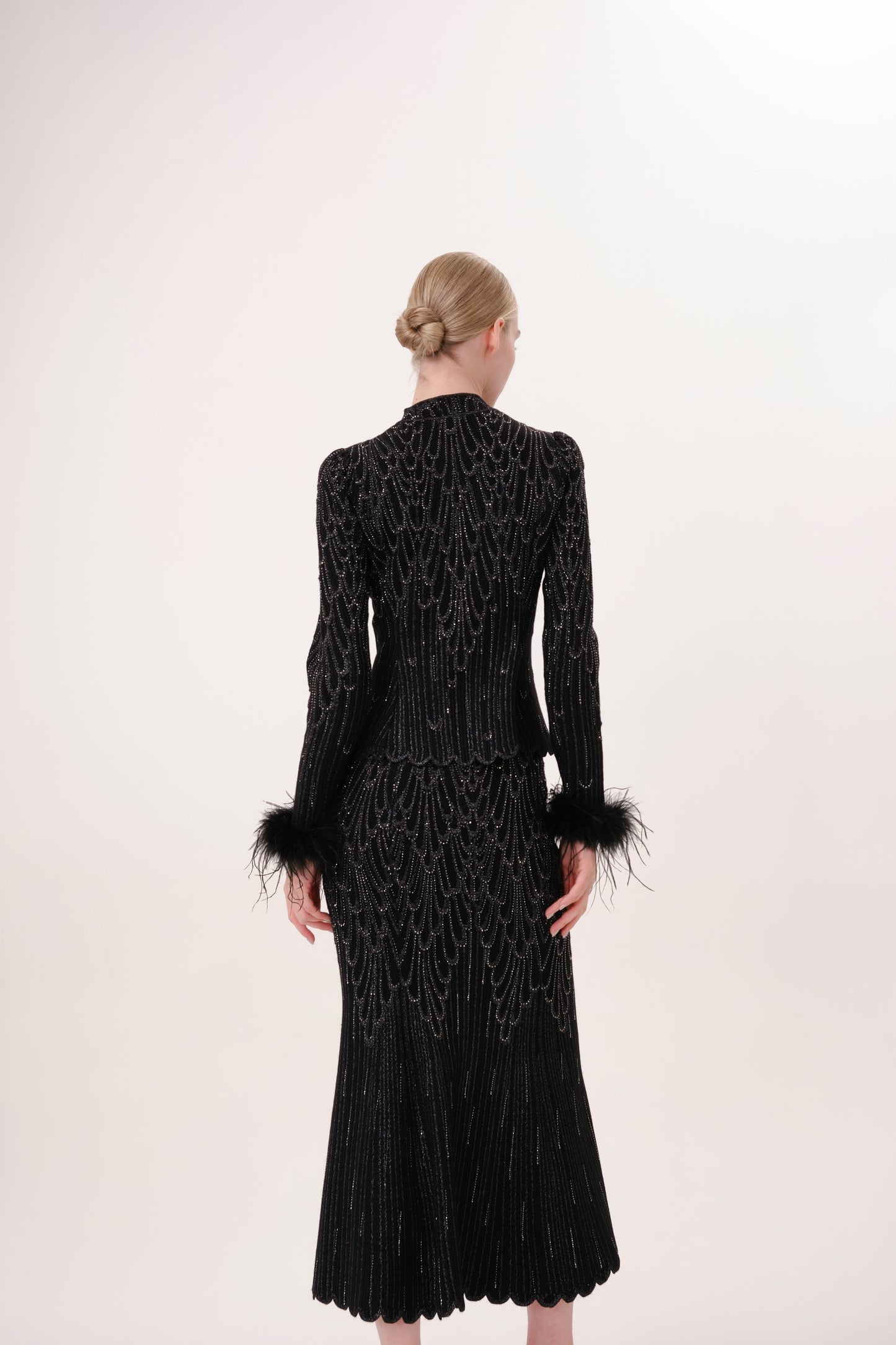 Black Mock Neck Feather Trim Rhinestone Knit Top