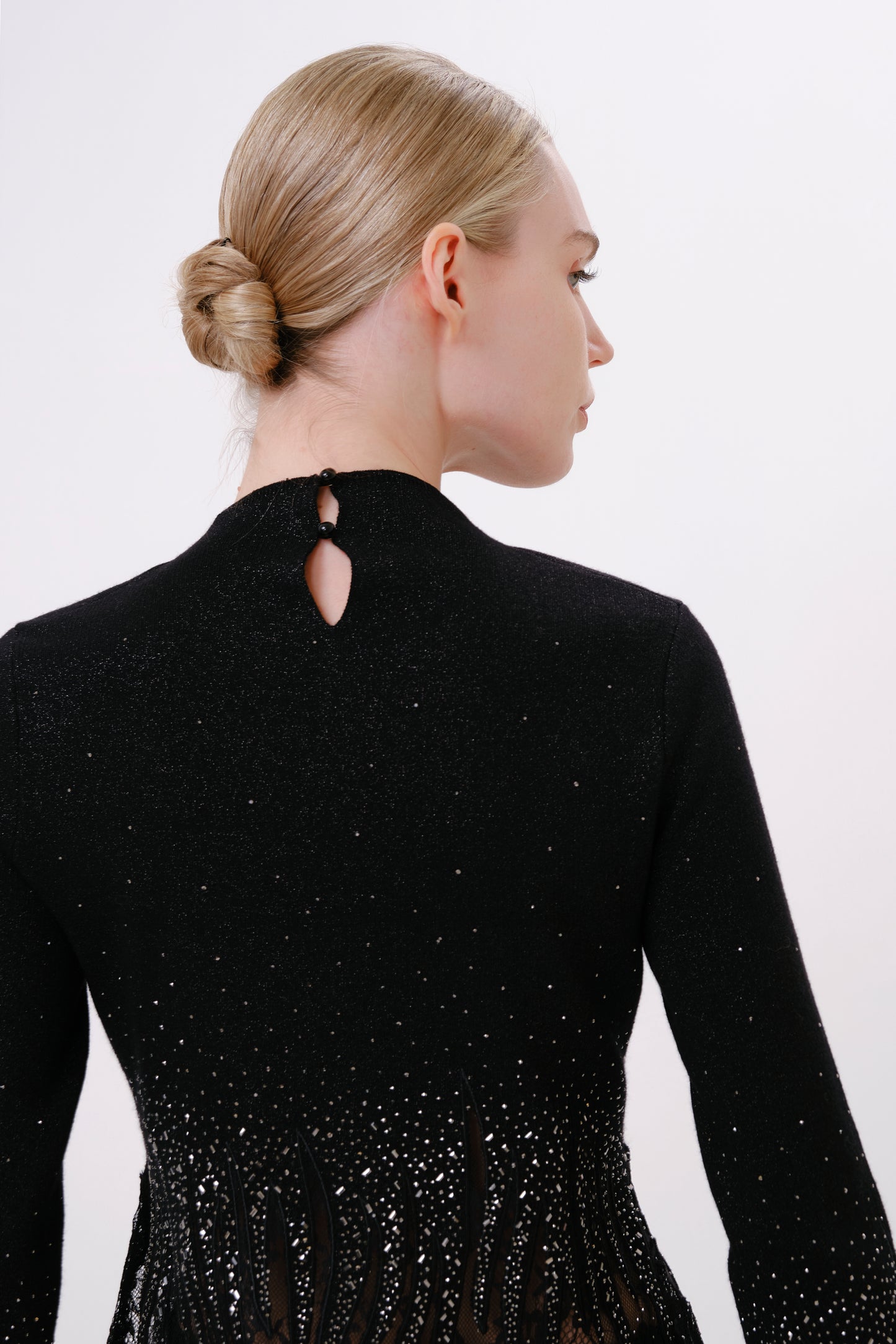 Black Mock Neck Rhinestone Sheer Hem Knit Top